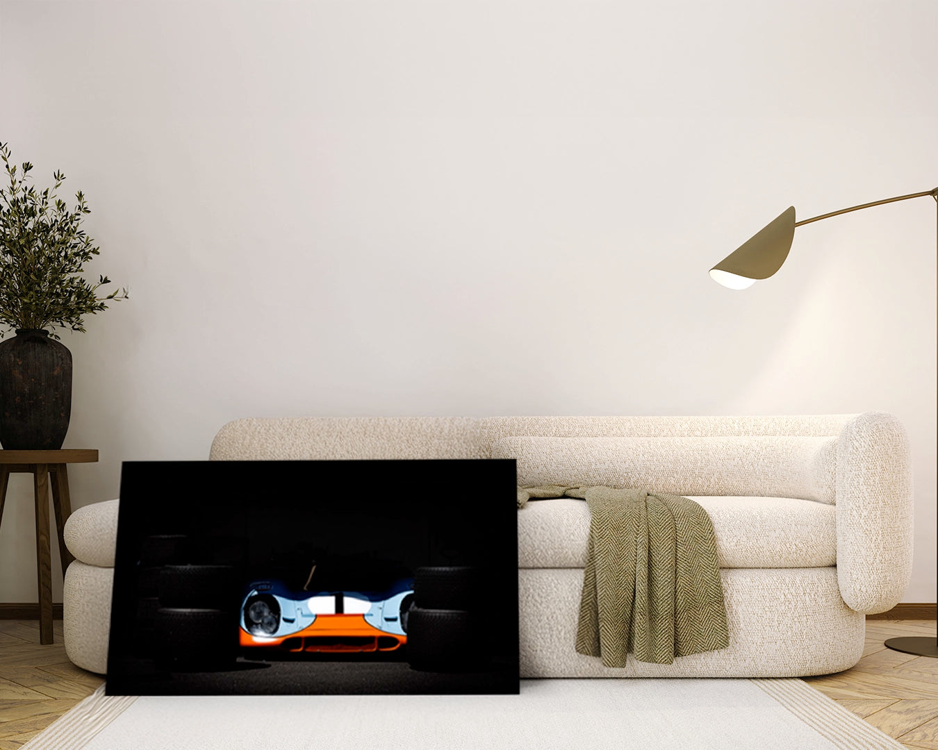Porsche 917K Gulf livery limited edition archival aluminium print displayed leaning against wall in modern interior