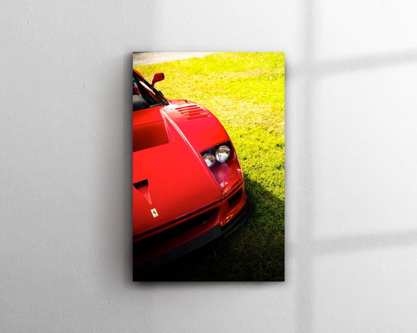Close-up front detail of Ferrari F40 LM Michelotto showing low splitter fixed headlights and NACA ducts in red