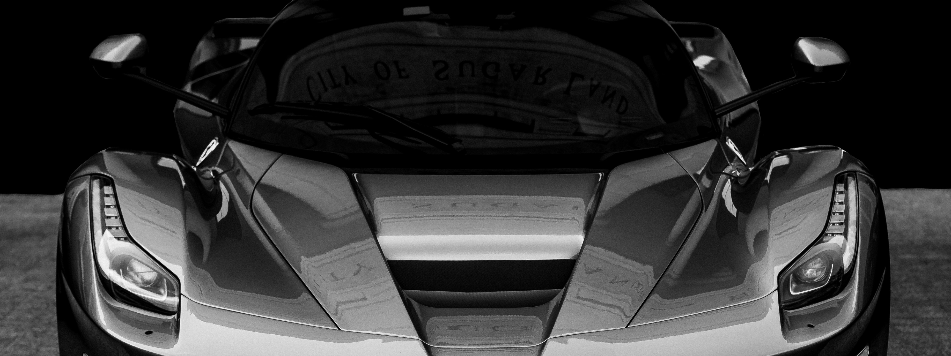 Black and white modern Ferrari hypercar fine art, showcasing bespoke automotive art and luxury corporate gifting for executives.