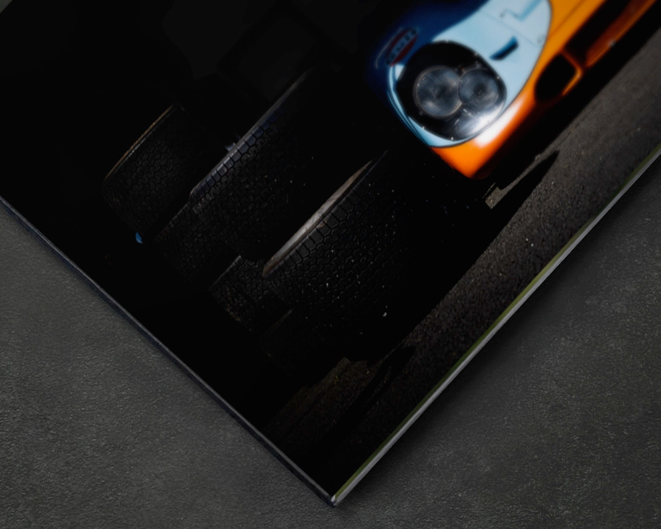 Close-up of Porsche 917K Gulf aluminium print showing colour depth of blue and orange on satin aluminium surface