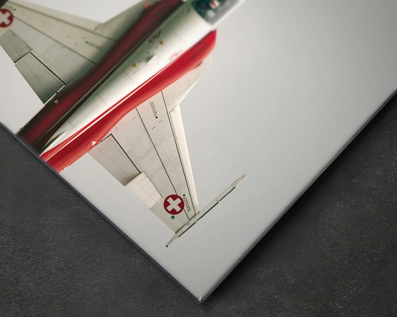 Close-up of Patrouille Suisse aluminium print showing aircraft detail and sky tones on satin aluminium surface