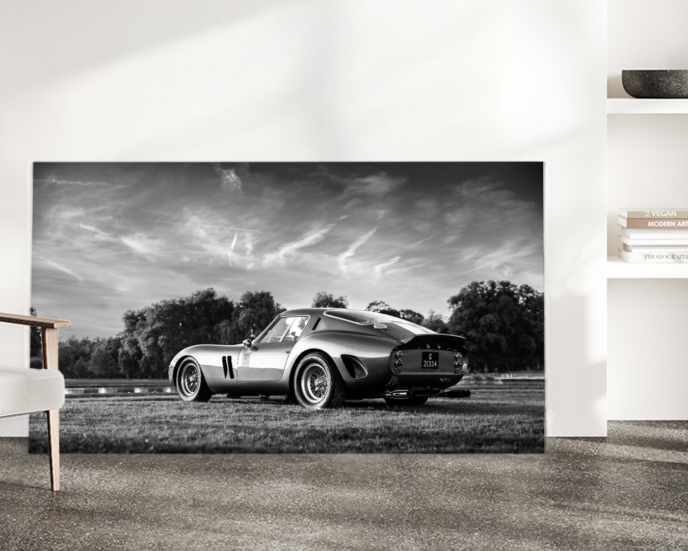 Ferrari 250 GTO black and white limited edition archival aluminium print displayed leaning against wall in modern interior
